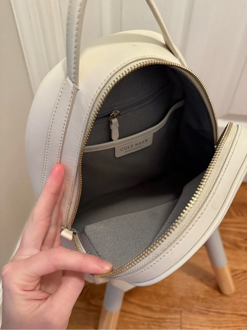 Cole Haan Cream Mini Backpack with Front Zip Pocket